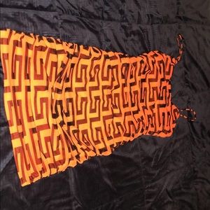 Orange Fashion Nova dress.